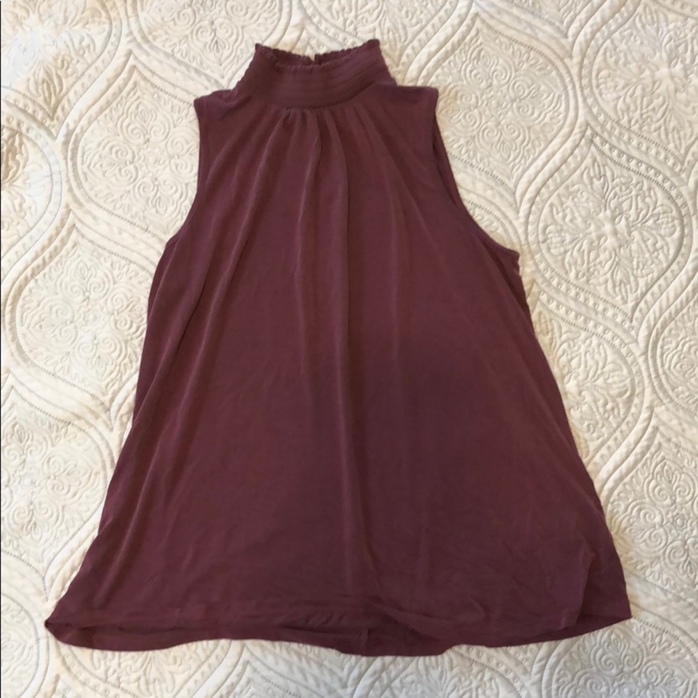Sleeveless turtle neck blouse